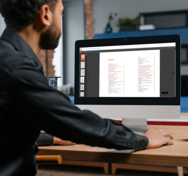 Person reading eBook on desktop screen
