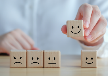 wooden blocks with faces